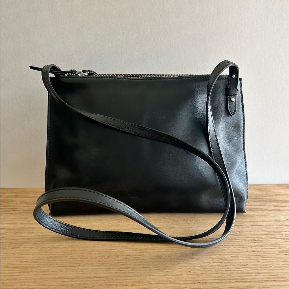Black leather cross body bag by Banana Republic